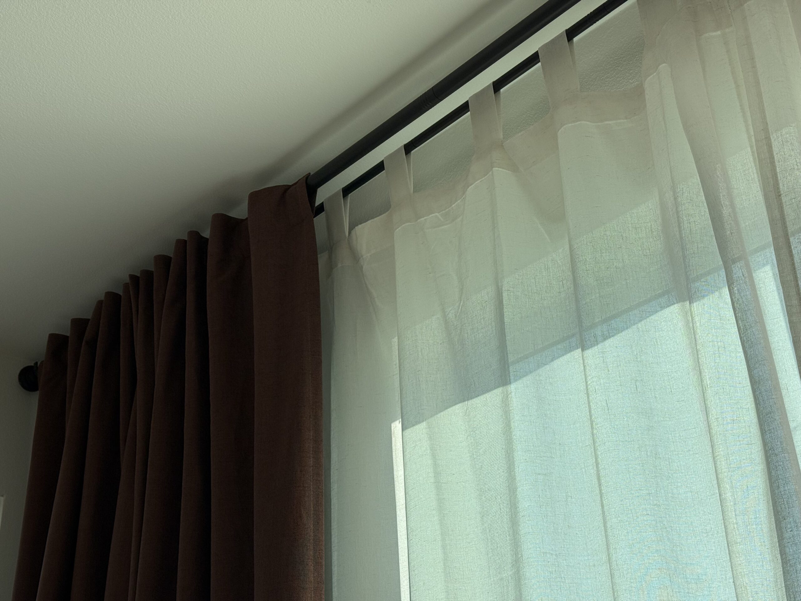bronze double rod curtain sheer and blackout details