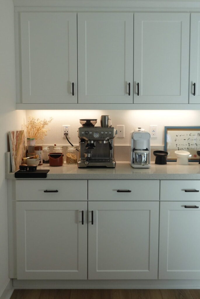 white kitchen cabinets with oil rubbed bronze hardware detail