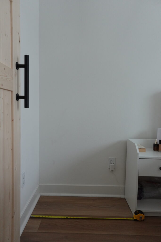 empty tight bedroom corner before makeup vanity nook