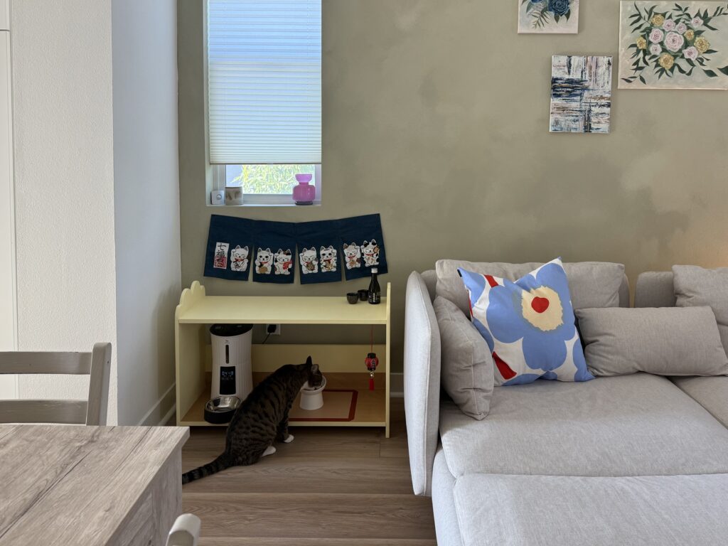 cat at izakaya themed DIY cat feeding station living room