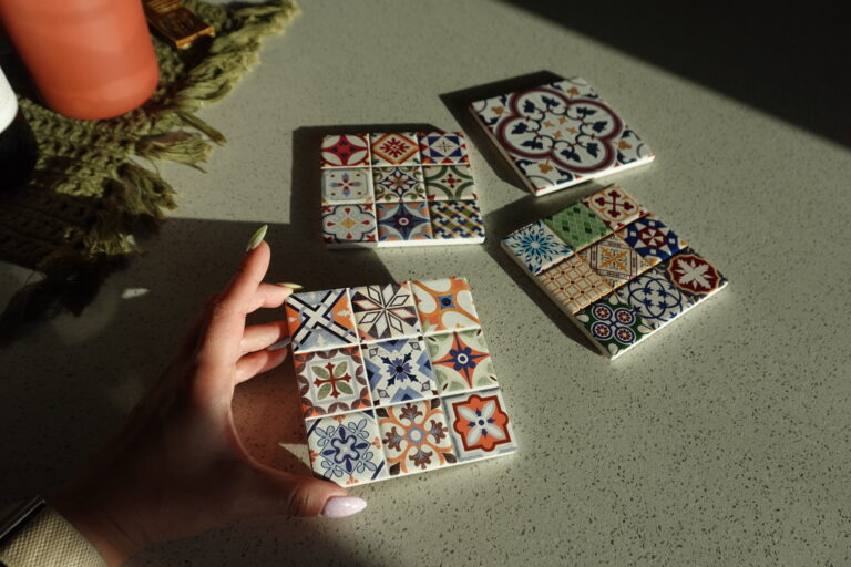 hand holding some Spanish tiles