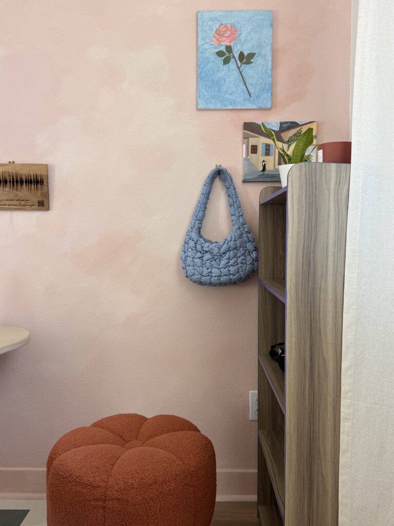west-facing creative office with a pink limewash wall